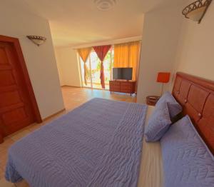 Voodi või voodid majutusasutuse West Bay Colonial toas