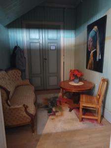 Posezení v ubytování Kungsgården BnB