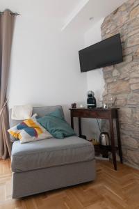 TV a/nebo společenská místnost v ubytování My Home Assisi