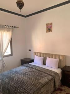 Postel nebo postele na pokoji v ubytování Residence Rosas