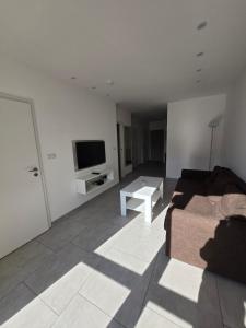 Telewizja i/lub zestaw kina domowego w obiekcie Artel Villa Tarsis