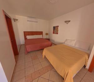 Voodi või voodid majutusasutuse West Bay Colonial toas