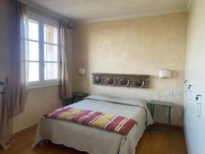 Ένα ή περισσότερα κρεβάτια σε δωμάτιο στο Tenuta Cantaia