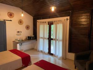 Postel nebo postele na pokoji v ubytování Hotel Quiloma Ranch