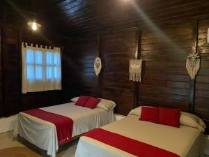 Postel nebo postele na pokoji v ubytování Hotel Quiloma Ranch
