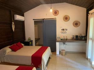 Postel nebo postele na pokoji v ubytování Hotel Quiloma Ranch
