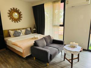 Ένα ή περισσότερα κρεβάτια σε δωμάτιο στο Patong city-center pool cozy condo +29 φωτογραφίες