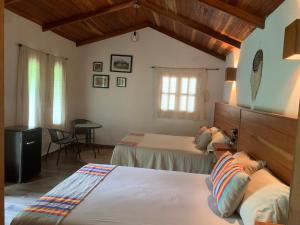 Postel nebo postele na pokoji v ubytování Hotel Quiloma Ranch