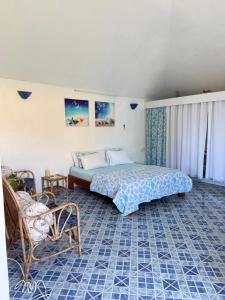 Posezení v ubytování Studio La Casa Azzura + 13 fotografií