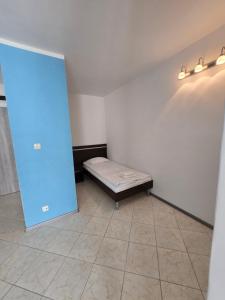 Łóżko lub łóżka w pokoju w obiekcie Artel Villa Tarsis