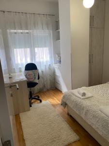 Katil atau katil-katil dalam bilik di Alexandra apartment