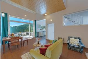 Posezení v ubytování Larisa Resort, Mussoorie