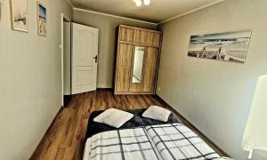 Posteľ alebo postele v izbe v ubytovaní Apartament Karolina - Zielone Tarasy