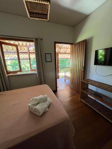 Postel nebo postele na pokoji v ubytování Pousada Vilarejo