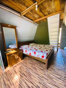 Una cama o camas en una habitación de komalie resort