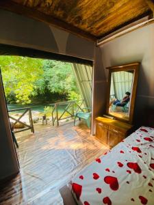 Una cama o camas en una habitación de komalie resort