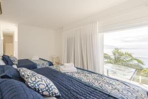 Ένα ή περισσότερα κρεβάτια σε δωμάτιο στο Casa com vista para o mar em Ilha Bela +68 φωτογραφίες