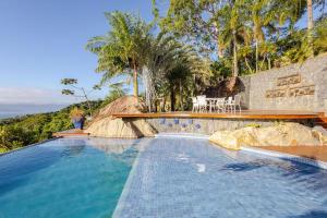 Πισίνα στο ή κοντά στο Casa com vista para o mar em Ilha Bela