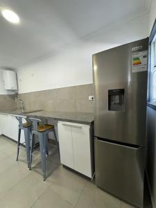 Kuchyň nebo kuchyňský kout v ubytování Centric Apart-Hotel