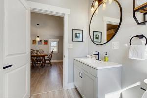 a bathroom with a sink and a mirror at Eagle's Nest in Bridgton +47 photos