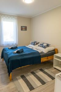 Postel nebo postele na pokoji v ubytování Süni apartman