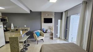 Televisor o centre d'entreteniment de Studio Life Essential com ar garagem wifi