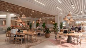 una representación de un restaurante con gente sentada en las mesas en Vibe Stay Sevilla Residencia de Estudiantes - Adults Only, en Sevilla