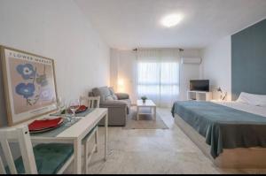 Ένα ή περισσότερα κρεβάτια σε δωμάτιο στο Estudio Anak-Gadis +25 φωτογραφίες