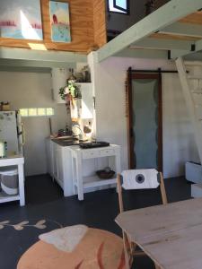 Voodi või voodid majutusasutuse Tiny House en Playa Dorada toas