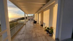 Een balkon of terras bij Appartamenti Addimuru
