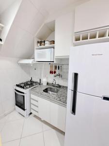 Η κουζίνα ή μικρή κουζίνα στο Duplex c/ lareira nas montanhas