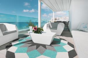 A seating area at Casa Ricardo PARADISE Apartment