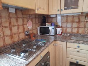 Kuchyň nebo kuchyňský kout v ubytování La casa di Giuly