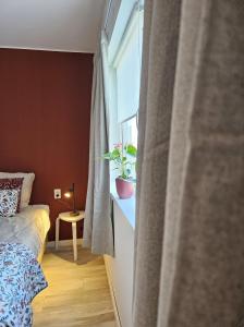 Postel nebo postele na pokoji v ubytování B&B it Arbeidershûske
