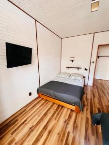 Postel nebo postele na pokoji v ubytování Dolpakart (domki, pokoje)