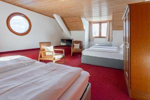 Łóżko lub łóżka w pokoju w obiekcie Hotel Gasthof Post