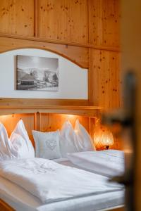 Łóżko lub łóżka w pokoju w obiekcie Hotel Gasthof Post