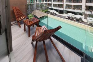 Bazén v ubytování Holiday Inn Tulum by IHG nebo v jeho okolí