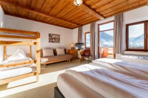 Postel nebo postele na pokoji v ubytování Hotel Gasthof Post
