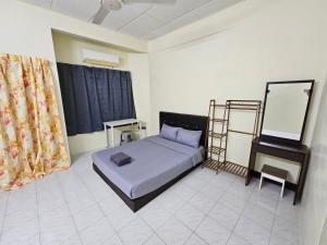 Postel nebo postele na pokoji v ubytování May Flower Hostel