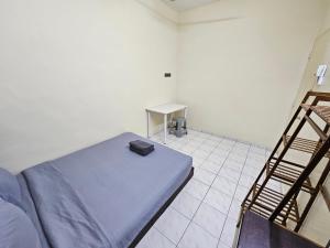Postel nebo postele na pokoji v ubytování May Flower Hostel