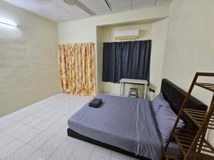 Postel nebo postele na pokoji v ubytování May Flower Hostel