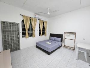 Postel nebo postele na pokoji v ubytování Double S Hostel