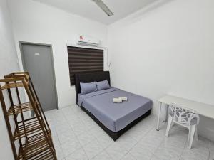 Postel nebo postele na pokoji v ubytování Double S Hostel