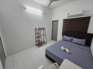 Postel nebo postele na pokoji v ubytování Double S Hostel