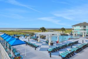 an image of the pool at the beach house resort at Mannanan Mac Lir in Galveston
