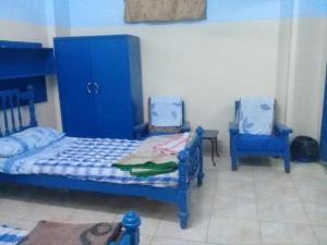 Postel nebo postele na pokoji v ubytování Oasis hotel