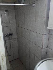 a bathroom with a shower and a toilet at Zagora MGHouse in Zagora +35 photos