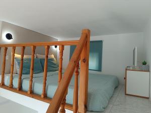 Posteľ alebo postele v izbe v ubytovaní Serene Ocean Haraki