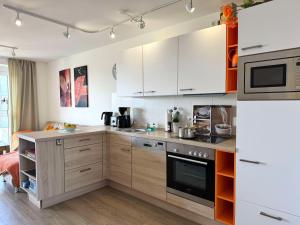 Η κουζίνα ή μικρή κουζίνα στο Ferienwohnung de Roggenbloom